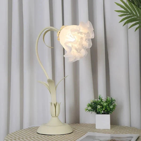 Elegant vintage table lamp with adjustable floral design